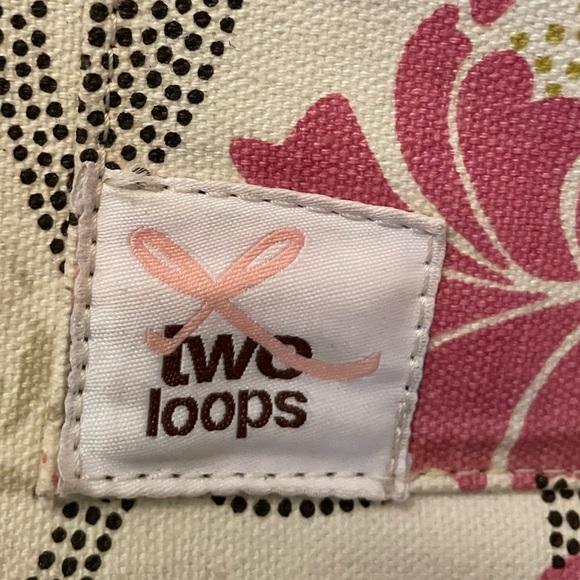 Two Loops Diaper Bag in a Pink Floral Pattern. - Picture 2 of 12